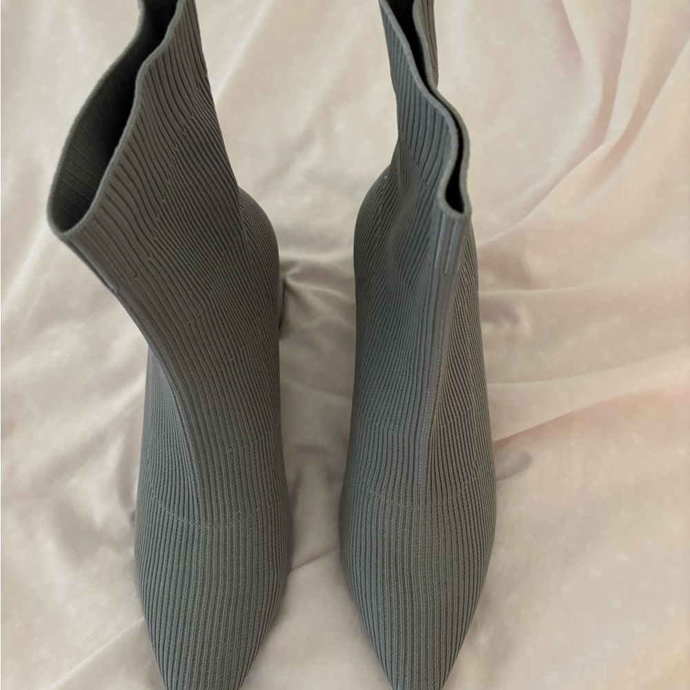 Woman’s grey slip on boots